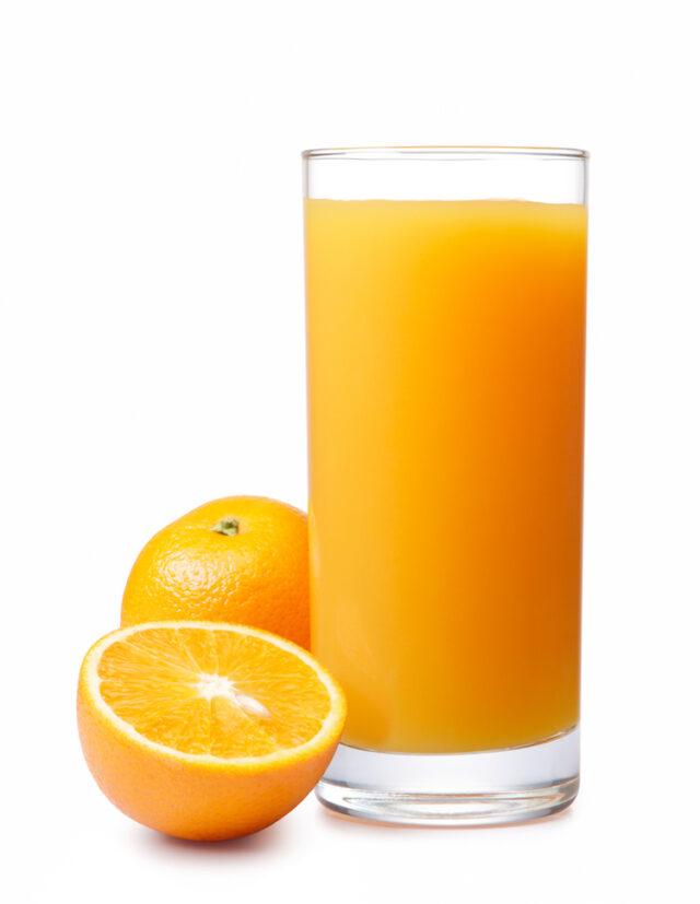 Glass Of Orange Juice And Fresh Oranges